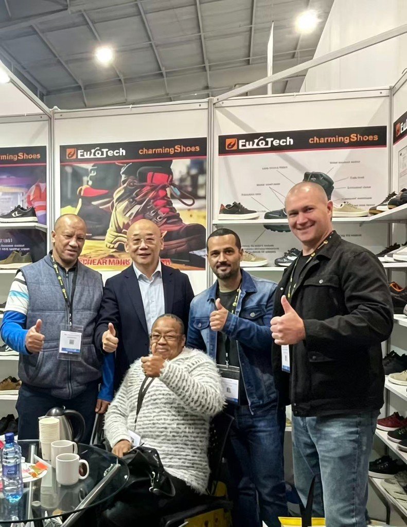 Charming Ever client group at the booth